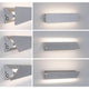 Schwenkbare LED Wandleuchte Katla in Alu gebürstet mit indirektem Licht für atmosphärische Wandbeleuchtung.