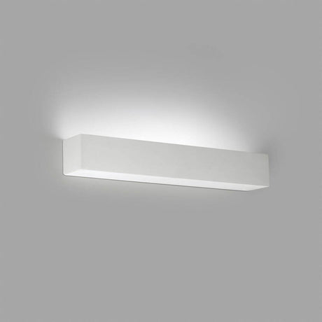LED Wandleuchte TERA Weiß in minimalistischer, rechteckiger Form an einer Wand montiert.