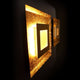 LED Wandleuchte Window M Silberfarben mit indirekter Beleuchtung und pyramidenstumpfförmigen Reflektor.
