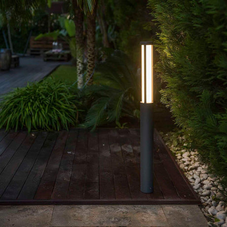 LED Path light LOGAR-1 IP54 dark grey 65 cm on wooden terrace in the garden