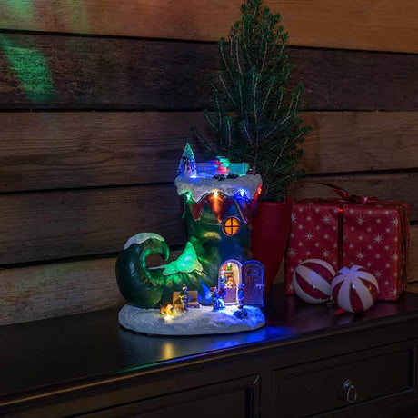 LED Christmas boot decorative light with music, battery-operated, festive Christmas decoration with lights.