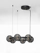 Las LED Pendelleuchte 6-flammig Ø 63cm 3000K Schwarz, Gold mit eleganten Glaskugeln.