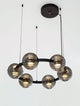 Las LED Pendelleuchte 6-flammig Ø 63cm 3000K Schwarz, Gold mit eleganter Gestaltung aus Metall und Glas.