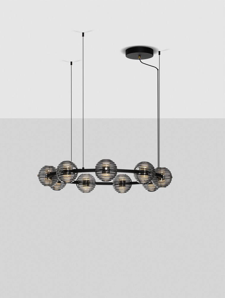 Las LED Pendelleuchte 9-flammig Ø 91cm 3000K Schwarz, Gold in modernem Design mit eleganten Metall- und Glaselementen.