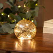 Leuchtende LED Weihnachtskugel Lua Ø 20cm, dekorative goldene Glas-Leuchtkugel für festliche Wohnraumdekoration
