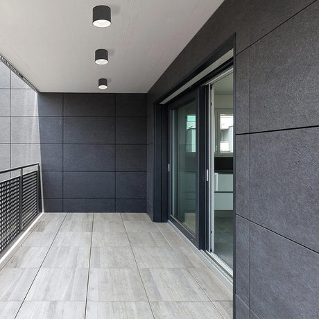 Hexa IP44 graphite ceiling outdoor light installed on a modern covered terrace.