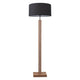 LED Stehlampe Asseto 3350lm Eiche-Geölt, Schwarz auf einem minimalistischen Holzfuß mit schwarzem Lampenschirm.