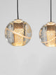 Licio Pendelleuchte Balken 84cm 5-flammig 3000K Gold mit transparentem Acryl und goldenem Aluminium.