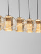 Licio Pendelleuchte Balken 84cm 5-flammig 3000K Gold mit eleganten, transparenten Acrylkugeln und warmweißem Licht.