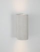 Lido Außenwandleuchte H 18cm GU10 Up & Down IP65 aus Beton mit minimalistischem Design an Wand montiert