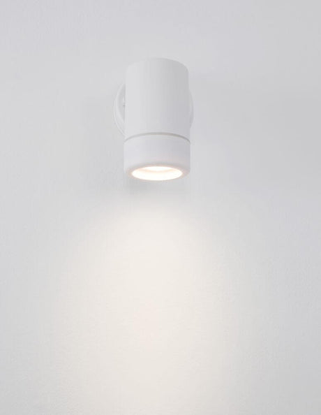 Limbio applique murale extérieure H 12 cm GU10 Down IP54 montée au mur avec une douce lueur lumineuse.