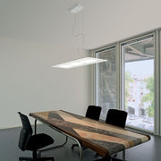 Dublight P LED-Rektangulær pendel over et moderne spisebord i et elegant rum.