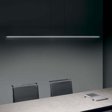 Straight P1 LED pendant light Large above a modern table in an elegant room.