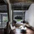 Lodes Rain LED Hängelampe Tropfen 7 Watt 1300 lm in modernem Wohnraum mit eleganter Beleuchtung.
