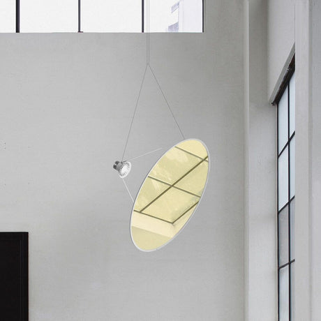Luceplan Amisol-reflektorplater i et moderne rom, oval med metallisert overflate og LED-belysning.