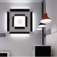 Luceplan Archetype Retro LED Pendelleuchte 10W 2700K in modernem Innenraum mit geometrischen Lichtakzenten.