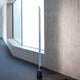 Luceplan Compendium LED Stehlampe (ohne Base) 3000K Schwarz in modernem Raum mit Fenster.