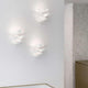 Luceplan Ivy LED Einbauwandleuchte 26W 2700K Weiß an einer Wand, modernes und stilvolles Design.