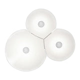 Luceplan LED Wandleuchte Bulbullia in innovativem Design mit drei kreisförmigen Elementen, inspiriert von Seifenblasen.