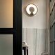 Luceplan Lightdisc LED Wand- & Deckenleuchte Ø 40cm in elegantem Design, installiert in modernem Innenraum.