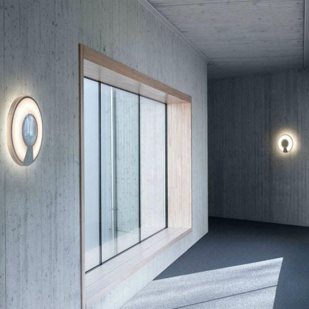 Helle Wand- und Deckenleuchte Lightdisc von Luceplan in modernem Raumdesign, beleuchtet mit sanftem Licht.