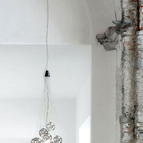 Luceplan Stochastic LED pendant lamp (structure without spheres & rods) in a modern room design.