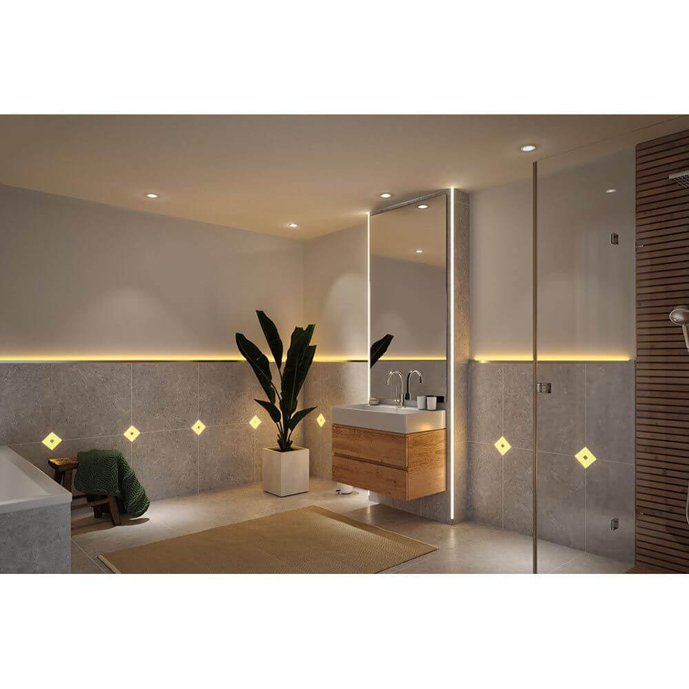 Moderne Badezimmergestaltung mit LumiTiles Kabel Square RGBW 1,9m Schwarz und stimmungsvollem Licht.