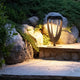 Les Jardins solar path light Tulip, black height-adjustable garden light 47cm with warm white LED light in a garden scene