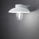 Mani Außen-Wandleuchte Weiß, klares Glas an einer Wand montiert, stilvolles Design mit klarem Licht.