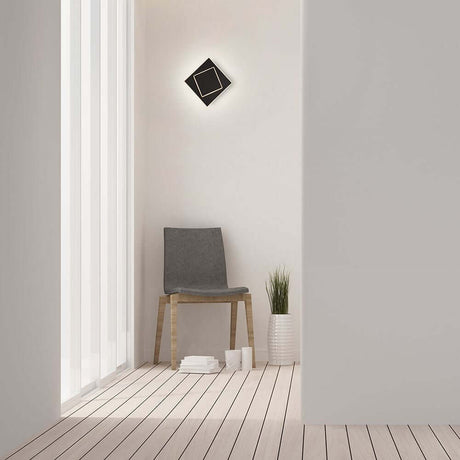 Moderne Einrichtung mit der Dakla LED-Wandlampe klein, eckig und minimalistischer Stil im Raum.