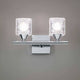 Doppel-Wandlampe Cuadrax Cristal mit geschwungener, eckiger Form und Glas-Elementen, moderne Lichtquelle.