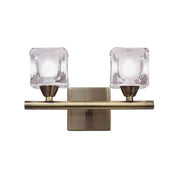 Applique murale double Cuadrax Cristal au design moderne, de forme angulaire et avec deux corps en verre.