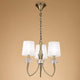 Loewe 3-flammige Pendelleuchte mit 3 Lampenschirmen in modernem Design und edlen Materialien.