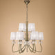 Loewe 9-flammige Pendellampe mit modernem Design und runder Form, Metall- und Glaselementen.