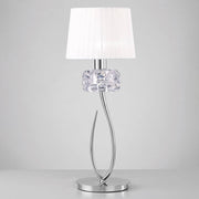 Loewe table lamp Large with elegant design, metal and glass, ideal for modern entrance areas.