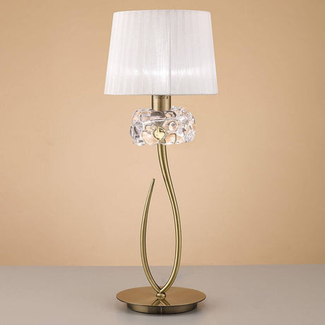 Loewe Tischleuchte Groß mit elegantem Design, runder Form und Materialien aus Metall und Glas.
