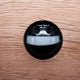 Ruka Sensor Außen-LED-Wandlampe Dunkelgrau, Detailansicht des Sensors auf Holzuntergrund.