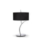 Tischlampe Eve mit runder Form, schwarze Textilshade und metallischer Basis, ideal für Wohnzimmer und Essbereiche.