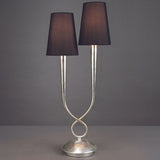 Moderne Tischlampe mit zwei schwarzen Lampenschirmen und silbernem Metallfuß für stilvolles Wohnen.