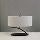 Tischleuchte Eve 2-flammige in modernem Design mit runder Form, Metall- und Textilmaterialien.