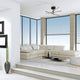 Moderne Wohnung mit Torch LED-Deckenlampe, stilvolles Ambiente mit runden Formen und hochwertigen Materialien.