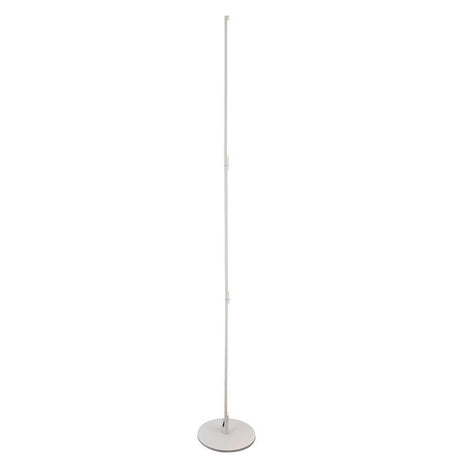 Torch LED floor lamp in a minimalist white finish with a round base and slim design.
