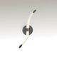 LED-Wandleuchte Armonia mit geschwungener Form, ideal für moderne Eingangsbereiche und stilvolle Lesezonen.