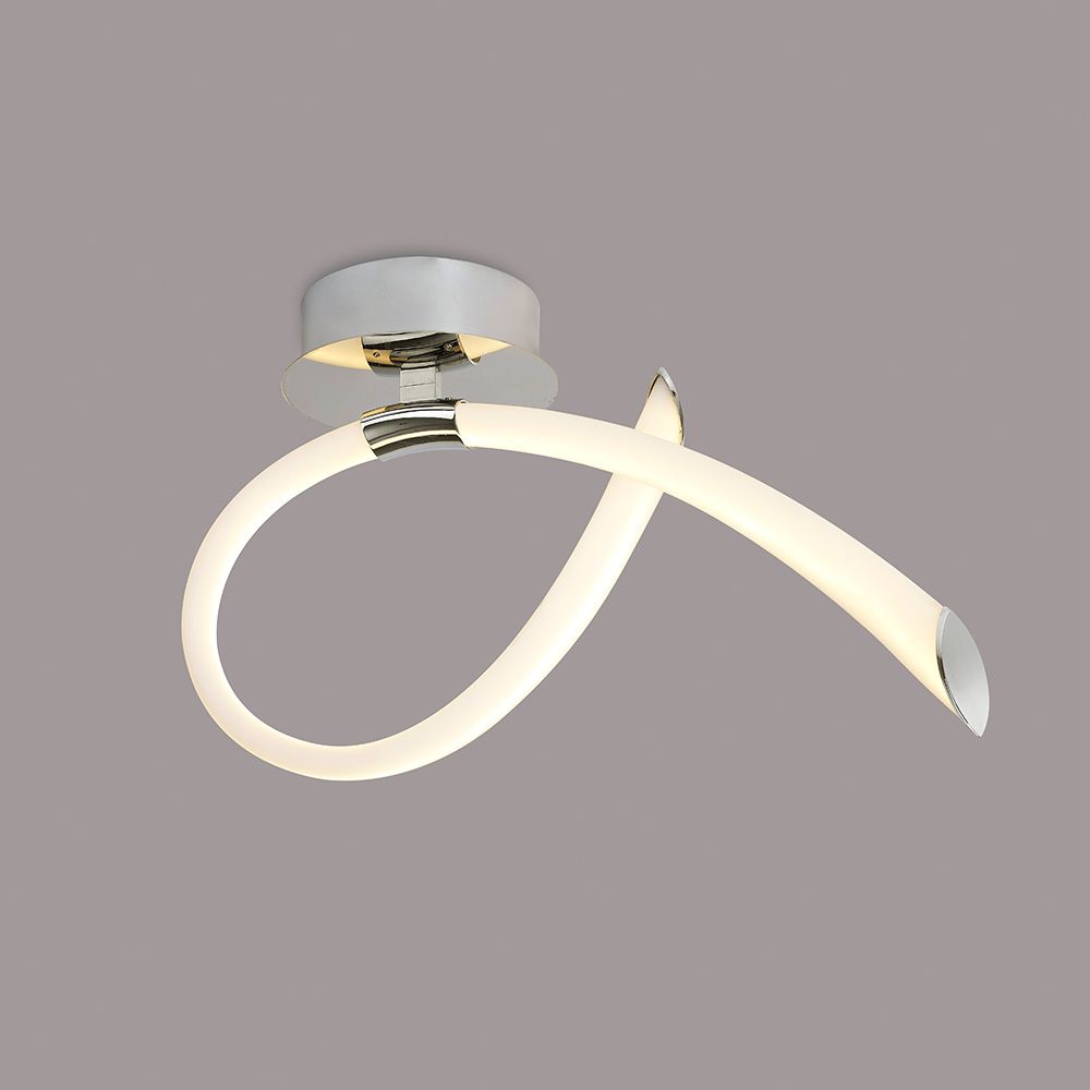 Moderne LED-Wandleuchte Schleife Armonia aus Metall und Kunststoff in geschwungener Form.