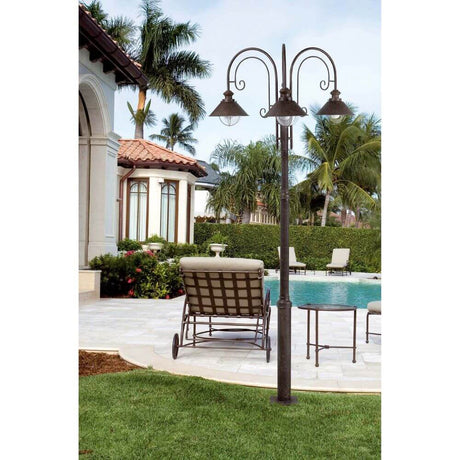 Pole light NAUTICA 3-light IP33 Rust Brown for outdoor use next to a pool with garden furniture.