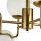 Erich Hängeleuchte aus Metallrahmen mit mattierten Diffusoren und eleganten goldenen Akzenten.