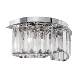 Glas Wandlampe Colline 2-flammig mit asymmetrischem Design und glanzpolierten Glaselementen in harmonischer Kolonnade.