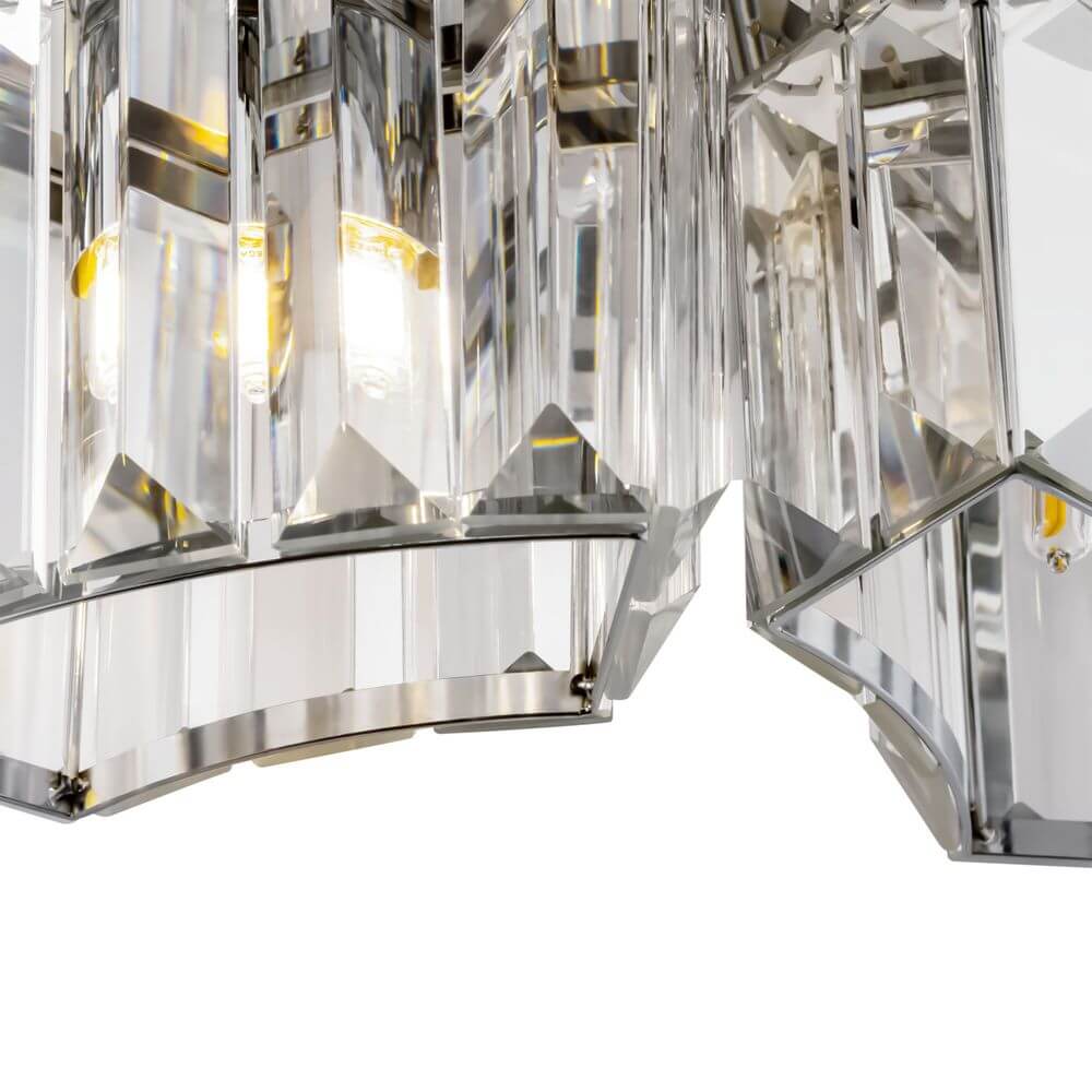 Glas Wandlampe Colline 2-flammig mit asymmetrischem Design und glanzpolierten Glaselementen.