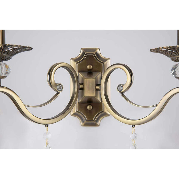 Grace wall light, 2-light, brass, with an elegant metal frame and crystal pendants.