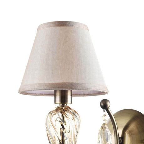 Murano wall light bronze, clear with cream-colored lamp and crystal pendant.